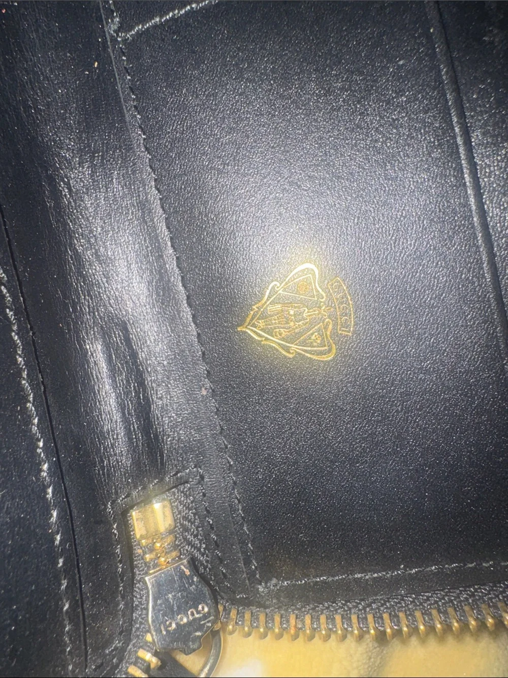 Gucci Black Embossed GG Zip Around Wallet